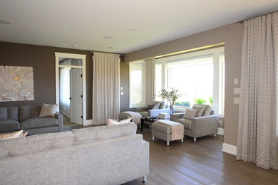 Photo of a transitional family room in Vancouver.