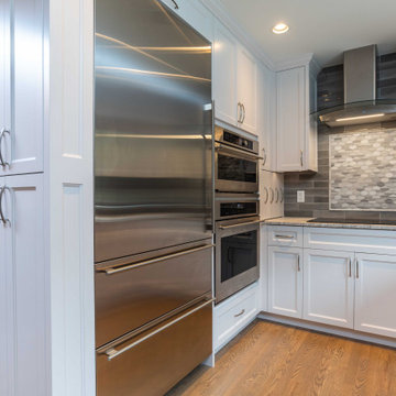 Modern Gray and White Kitchen with Peninsula Seating for 4