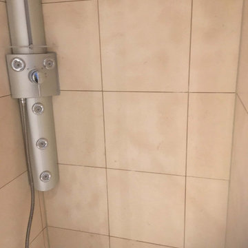 Renovating a Mouldy White Limestone Shower Cubicle in Manchester