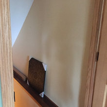 Decoration on wall leading to basement