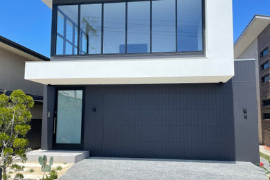 Contemporary attached two-car garage in Newcastle - Maitland.