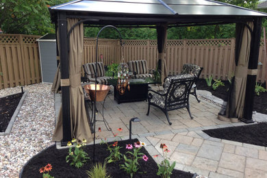 Patio - modern patio idea in Toronto