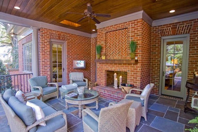 Patio - mid-century modern patio idea in Charlotte
