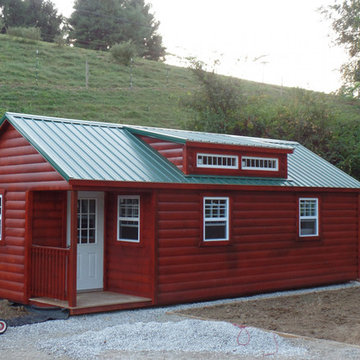 Red Log Sided Cabin Shed