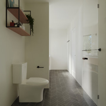 Whistler Bathroom - Herringbone Tile & Hallway View