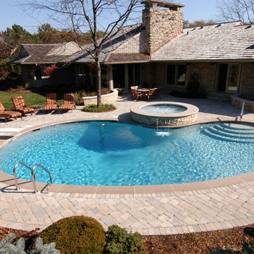 Northbrook, IL Freeform Pool with Round Elevated Hot Tub