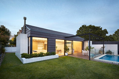 Inspiration for a mid-sized contemporary one-storey brick black exterior in Melbourne.