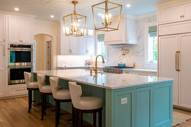 Example of a large classic l-shaped kitchen design in Other with recessed-panel cabinets, white cabinets, quartz countertops, quartz backsplash, an island and white countertops