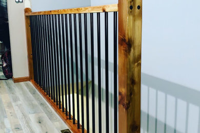 Inspiration for a rustic staircase remodel in Wichita