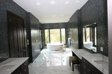 Large minimalist master black tile, blue tile, multicolored tile and mosaic tile bathroom photo in Dallas with flat-panel cabinets, black cabinets, multicolored walls, an undermount sink and granite countertops