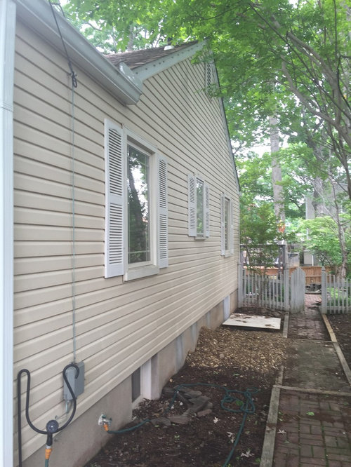 Should I paint my brick house /sidings / trim door