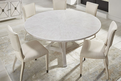 Example of a transitional white floor dining room design with white walls