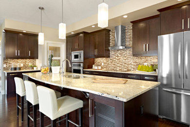 Eat-in kitchen - mid-sized contemporary l-shaped eat-in kitchen idea in Edmonton with an island