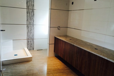 Example of a minimalist white tile bathroom design in Calgary