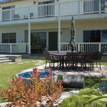 Mangaris wood porch, elevated pool, and reclaimed flagstone patio.