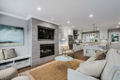 Large transitional medium tone wood floor kitchen photo in Vancouver