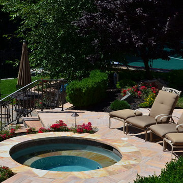 Custom Pools & Spas, Outdoor Kitchens, Patios & Walkways, and Plantings