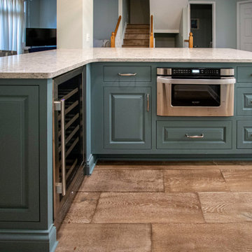 Coastal Kitchen with Custom Classic White Cabinetry and Teal Island