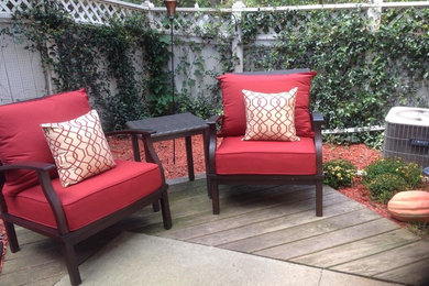 Inspiration for a small contemporary backyard concrete patio remodel in Other with no cover