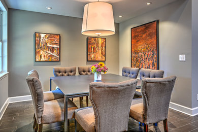 Mid-sized transitional dark wood floor and brown floor great room photo in Jacksonville with gray walls and no fireplace