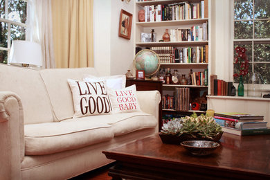Inspiration for a large modern open concept dark wood floor living room remodel in Orange County with white walls
