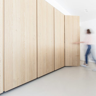 Large contemporary kitchen pantry photos - Kitchen pantry - large contemporary gray floor kitchen pantry idea in Venice with beaded inset cabinets, light wood cabinets and an island