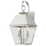 Livex Lighting - Wentworth 2 Light Brushed Nickel Outdoor Medium Wall Lantern - With its appealing brushed nickel finish and clear glass, the stunning Mansfield collection will make an elegant addition to any outdoor space. Formed from solid brass & traditionally inspired, this downward hanging two-light outdoor medium wall lantern is perfect for a driveway, back porch or entry way. With superb craftsmanship and affordable price, this fixture is sure to be a timeless addition to your home.