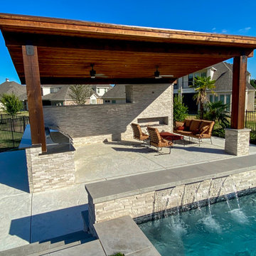 Modern Hillside Pool with Fire and Water Features