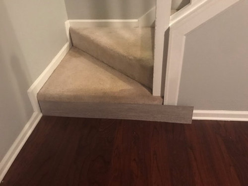 Transition From Cherry Floors To Gray Vynil, How To Transition Laminate Flooring Stairs