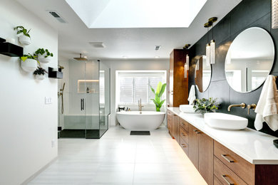 Example of a large minimalist master white tile and porcelain tile porcelain tile, white floor and double-sink bathroom design in Portland with flat-panel cabinets, medium tone wood cabinets, a one-piece toilet, white walls, a vessel sink, quartz countertops, a hinged shower door, white countertops, a niche and a floating vanity