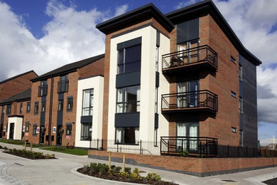 Design ideas for a contemporary house exterior in West Midlands.
