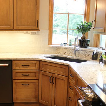Maple Kitchen With Black and Gold Accents