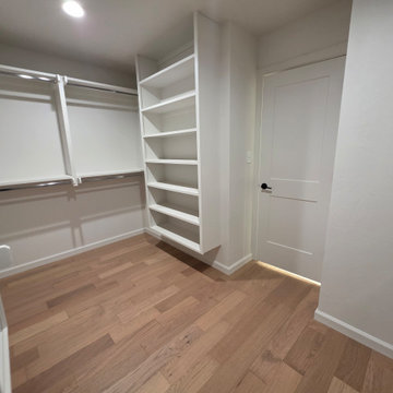 Closet with hardwood floors