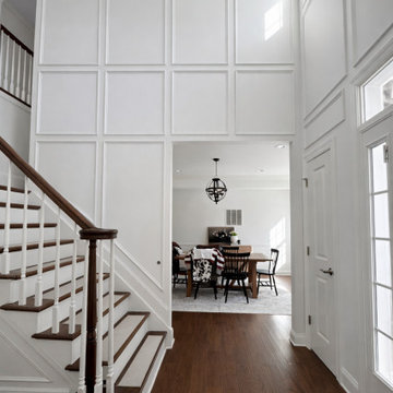 Architectural Foyer Enhancement with Custom Panel Molding | Caliber Construction