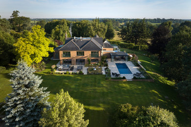 Design ideas for a modern house exterior in Hertfordshire.
