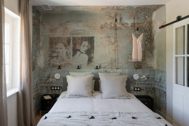 This is an example of an eclectic bedroom in Milan.
