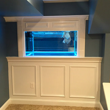 Basement renovation with Custom fish tank built in