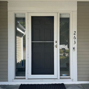 Original entry door before replacement – outdated and less energy efficient - Ma