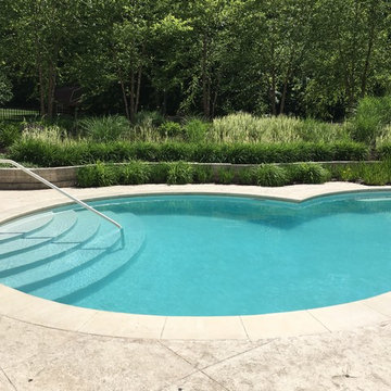 Cedar Rapids, Iowa - Custom Concrete Swimming Pool with Rock Waterfall Feature