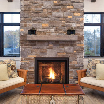 Elegant Farmhouse Interior with Rustic Mantle on Fireplace