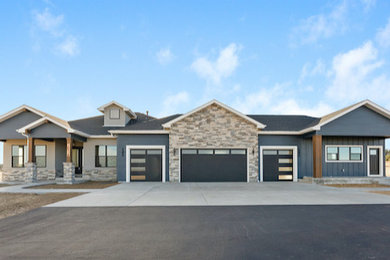 Inspiration for a large transitional exterior home remodel in Denver
