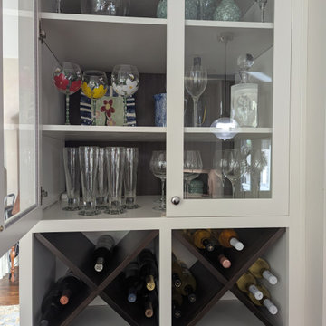 White inset cabinetry with walnut custom accents