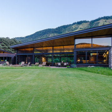 Main House and Master Suite roof mimic the slope of the ridge beyond