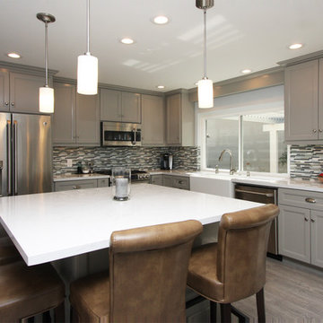 Kitchen with gray cabinets & Cambria countertops