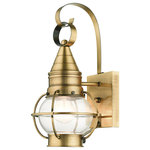 Livex Lighting - Antique Brass Nautical, Farmhouse, Bohemian, Colonial, Outdoor Wall Lantern - The Newburyport outdoor small single-light wall lantern boasts classic nautical and railway styling. This piece features a beautiful hand-blown clear glass globe and an antique brass finish over the hand crafted solid brass construction. With its easy installation and low upkeep requirements, this light will not disappoint.