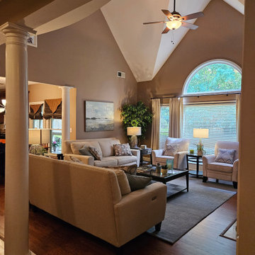 Living Room with Vaulted Ceiling and Palladian Window