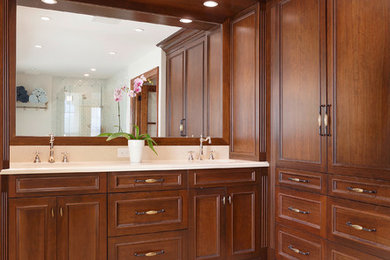 Inspiration for a timeless beige tile bathroom remodel in Miami