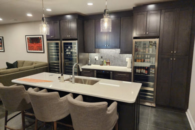 Inspiration for a huge modern single-wall ceramic tile and multicolored floor wet bar remodel in Other with an undermount sink, shaker cabinets, dark wood cabinets, quartz countertops, gray backsplash, ceramic backsplash and black countertops