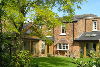 Design ideas for a contemporary house exterior in Cheshire.