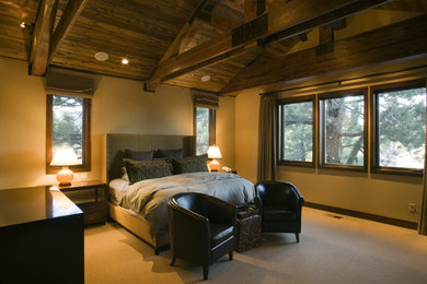 Bedroom - large traditional master carpeted bedroom idea in Other with beige walls and no fireplace